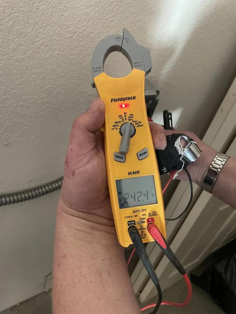 Voltage testing with clamp meter during Generator Installation in Kingsland